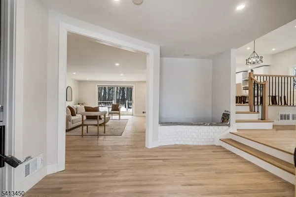 a view of a living room and a rug floor