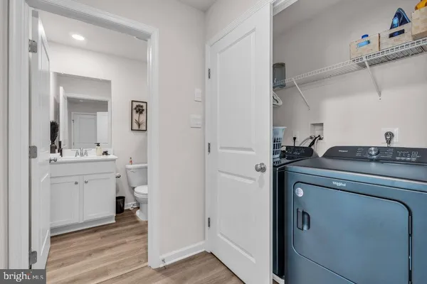 a view of a sink and a mirror