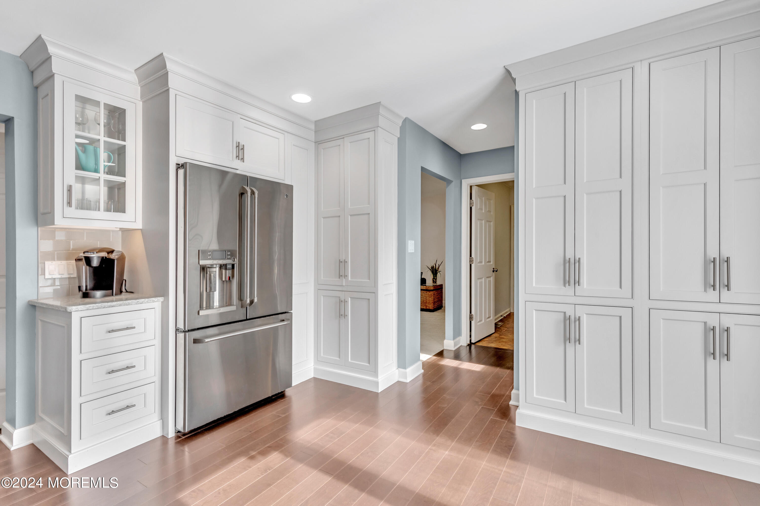 60 Chambers Road Cream Ridge, NJ 08514 - Photo 15 of 51 a kitchen with white cabinets and refrigerator