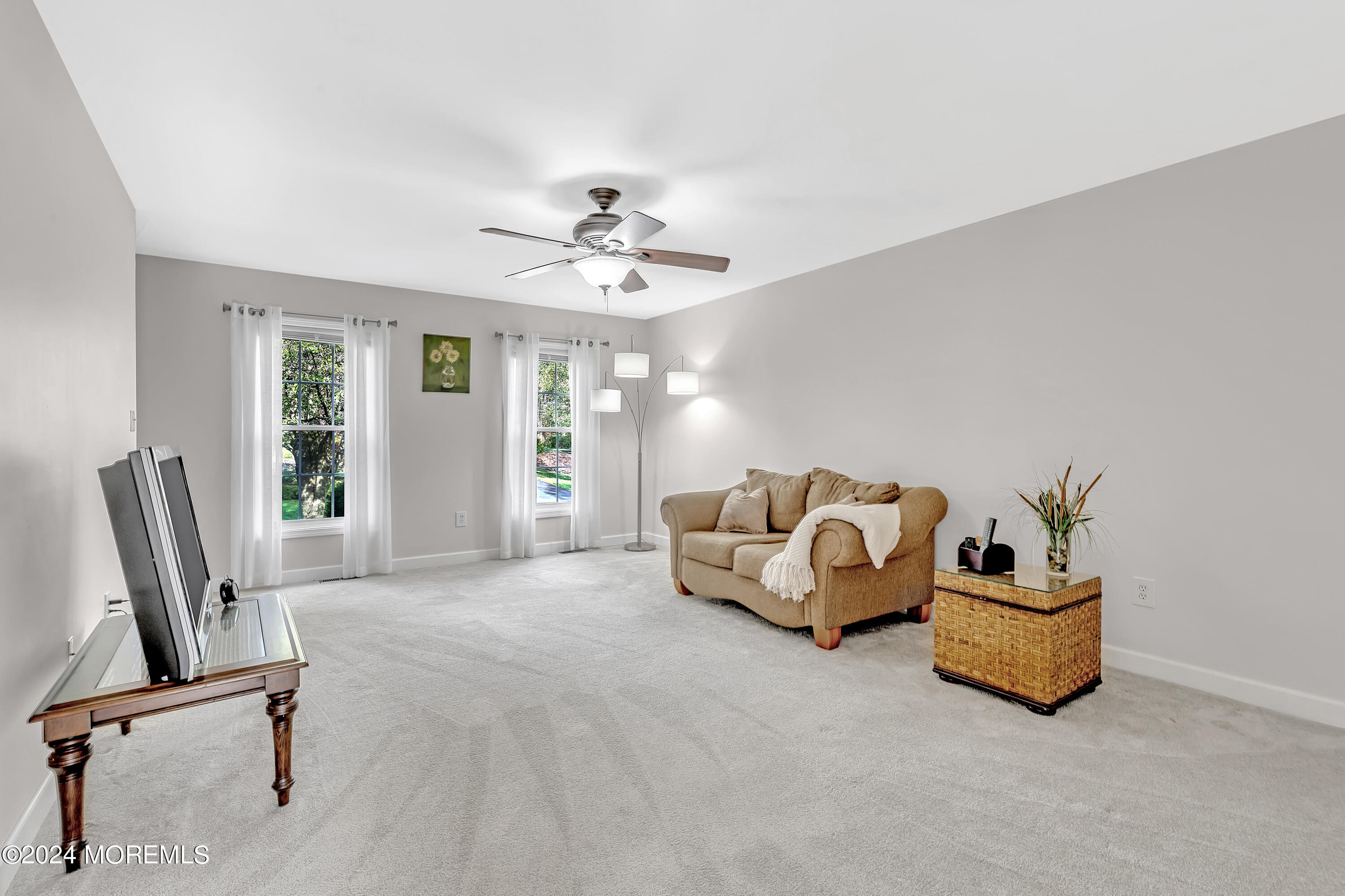 60 Chambers Road Cream Ridge, NJ 08514 - Photo 20 of 51 a living room with furniture gym equipment and a window