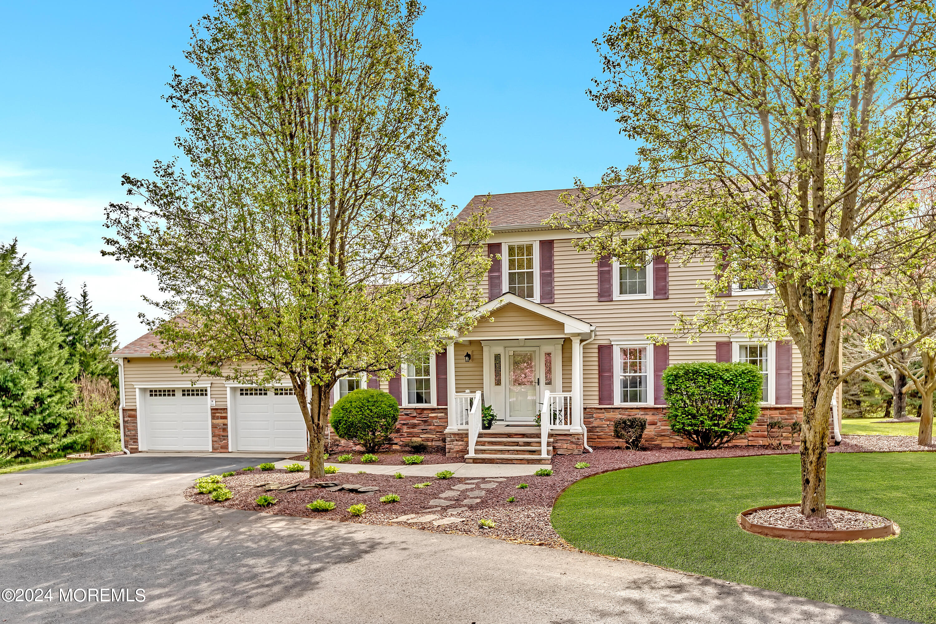 60 Chambers Road Cream Ridge, NJ 08514 - Photo 2 of 51 a front view of a house with a yard and tree s