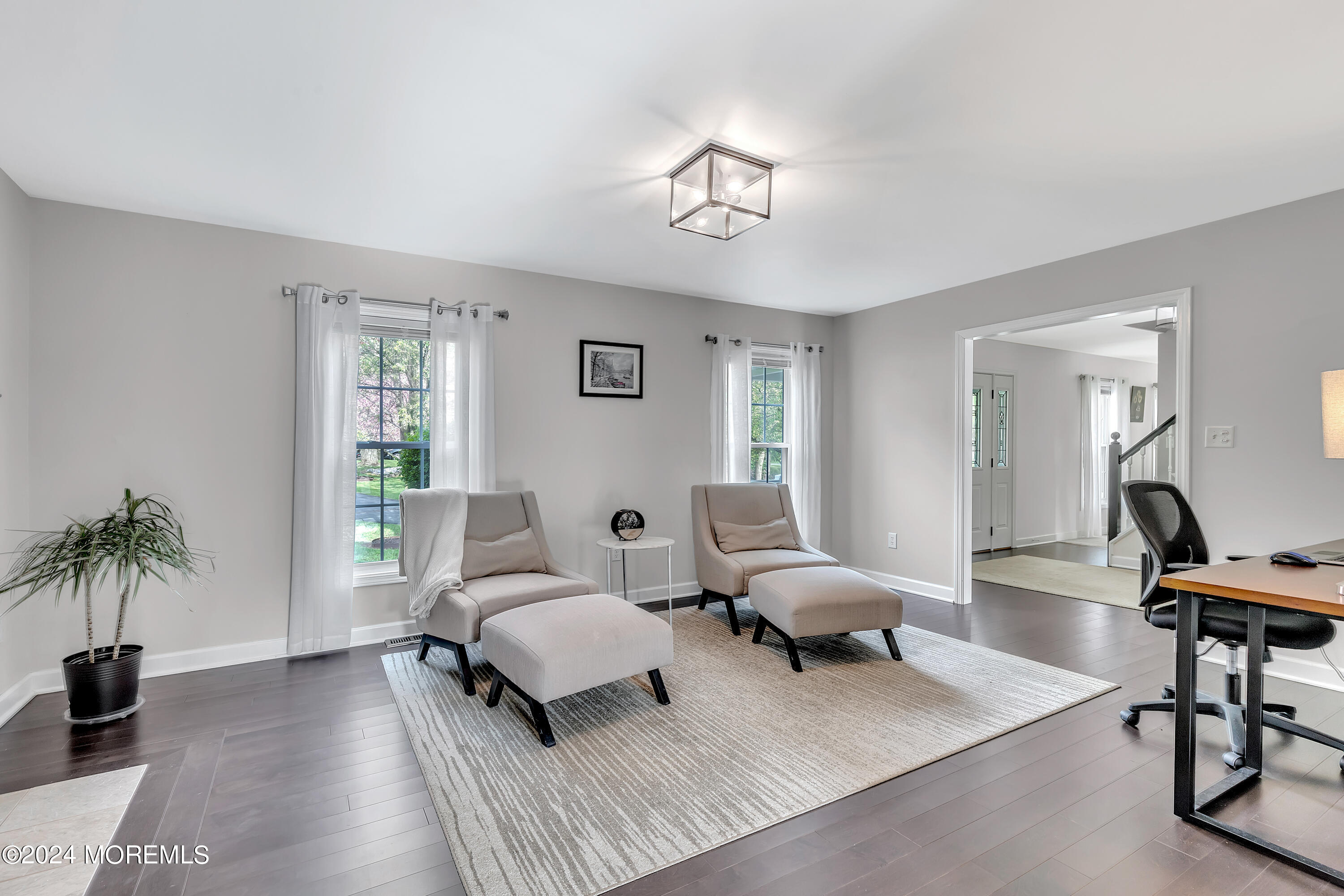 60 Chambers Road Cream Ridge, NJ 08514 - Photo 23 of 51 a living room with furniture and a potted plant