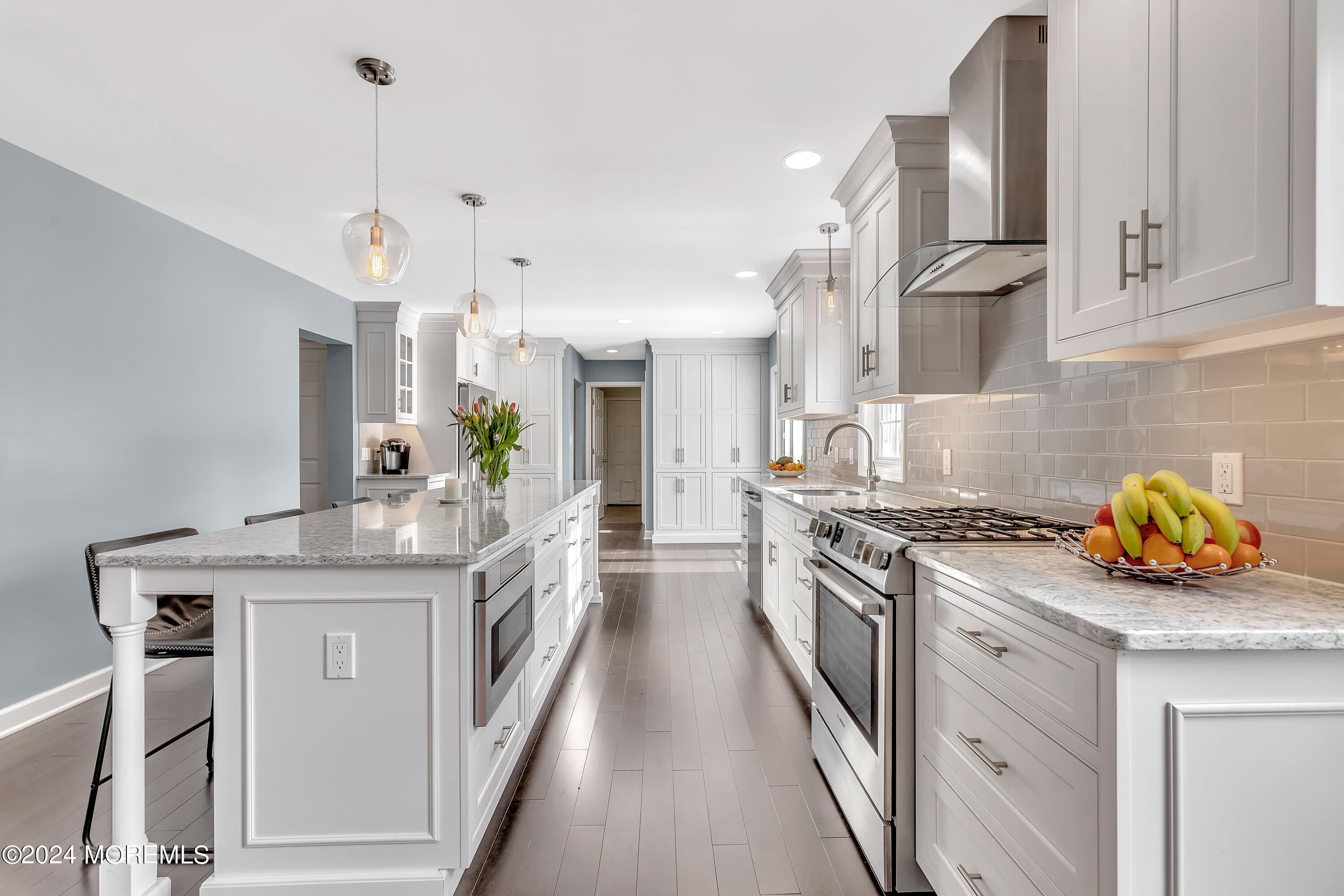60 Chambers Road Cream Ridge, NJ 08514 - Photo 10 of 51 a kitchen with stainless steel appliances granite countertop a lot of counter space and wooden floors