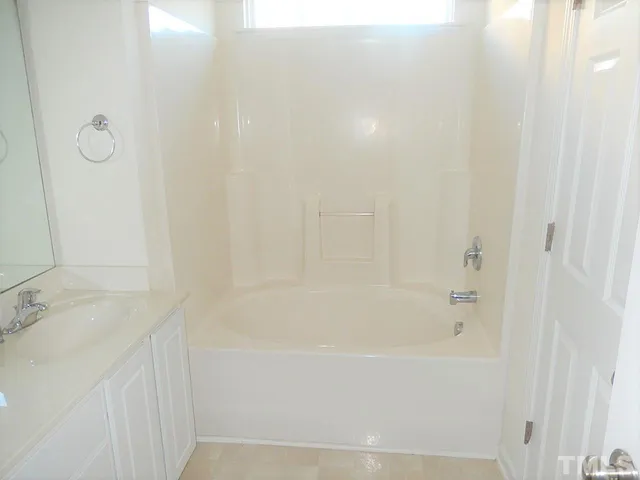 a bathroom with a bathtub