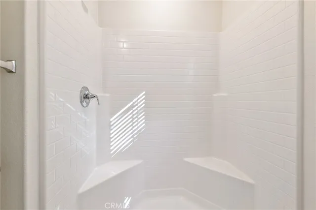 a view of a livingroom with a ceiling fan