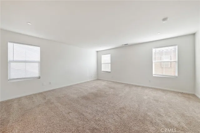 a bathroom with a toilet sink and shower