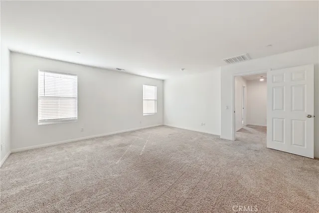 a spacious bathroom with a bathtub and a shower