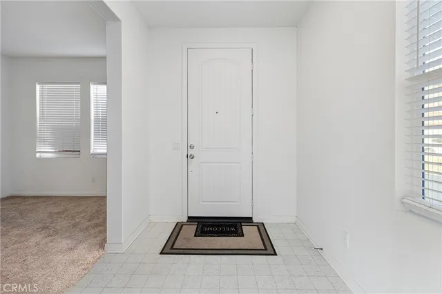 a view of an entryway with a livingroom