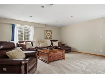 a living room with furniture and window