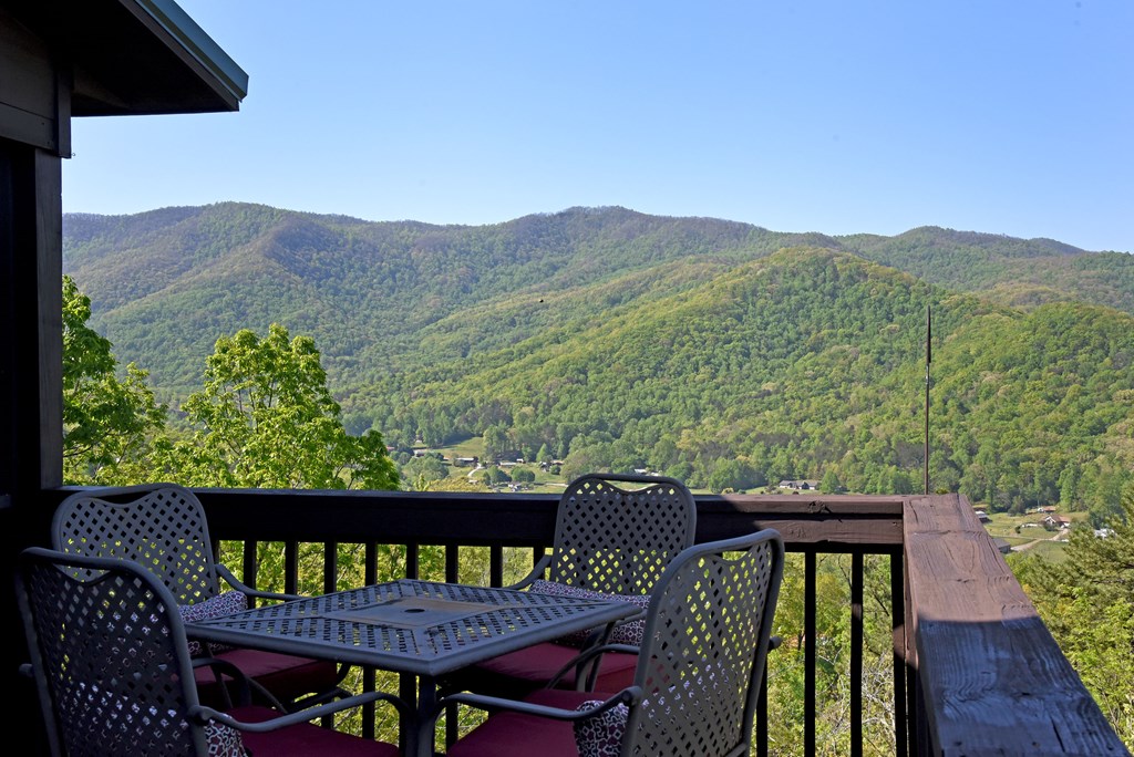 299 Bethabara View Hayesville, NC 28904 - Photo 28 of 131 a view of a chairs and table in the balcony