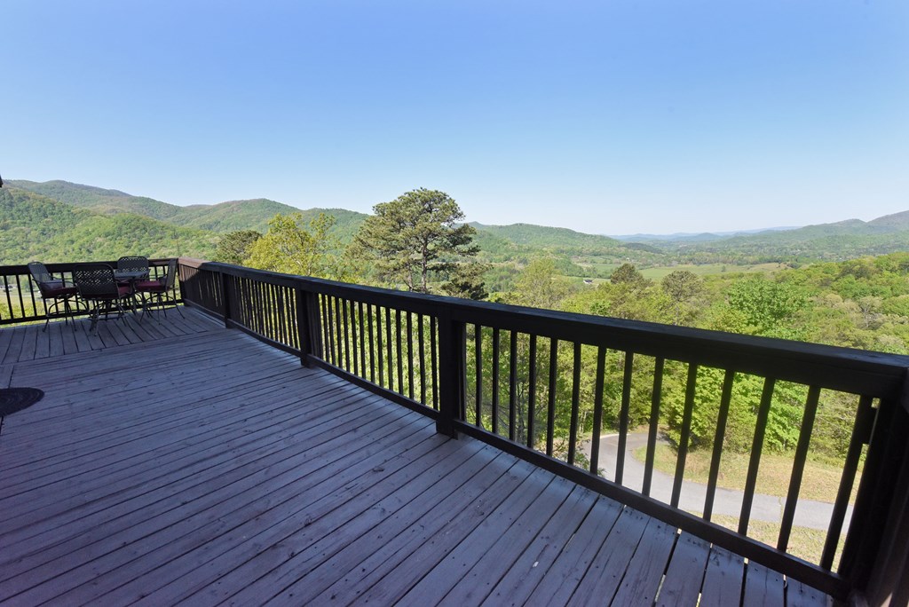 299 Bethabara View Hayesville, NC 28904 - Photo 33 of 131 a balcony with wooden floor and fence