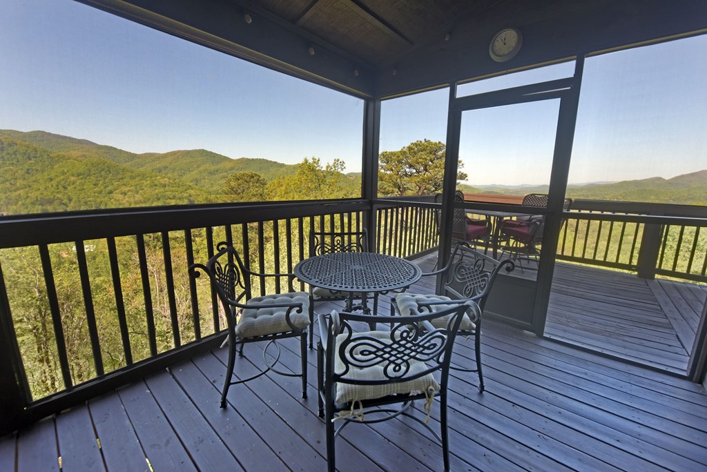 299 Bethabara View Hayesville, NC 28904 - Photo 36 of 131 a view of a balcony with furniture