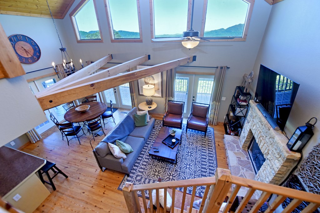 299 Bethabara View Hayesville, NC 28904 - Photo 53 of 131 a living room with furniture and wooden floor