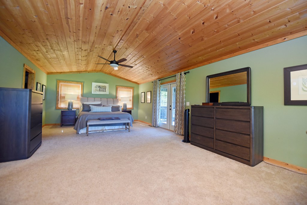 299 Bethabara View Hayesville, NC 28904 - Photo 55 of 131 a living room with furniture and a flat screen tv
