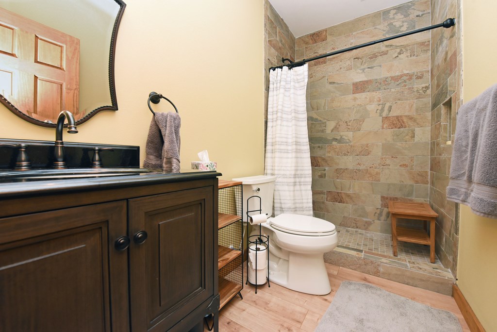 299 Bethabara View Hayesville, NC 28904 - Photo 71 of 131 a bathroom with a sink toilet and shower