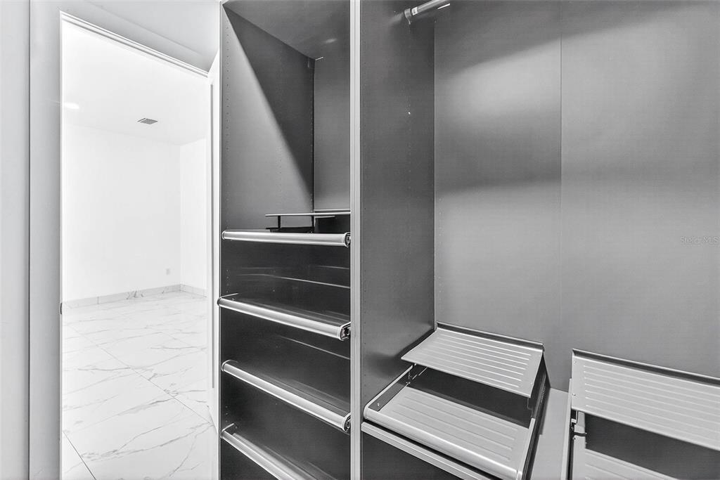 216 North Glen Arven Avenue Temple Terrace, FL 33617 - Photo 45 of 61 a view of walk in closet with empty racks