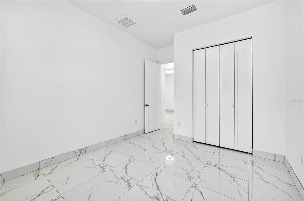 216 North Glen Arven Avenue Temple Terrace, FL 33617 - Photo 49 of 61 a view of an empty room
