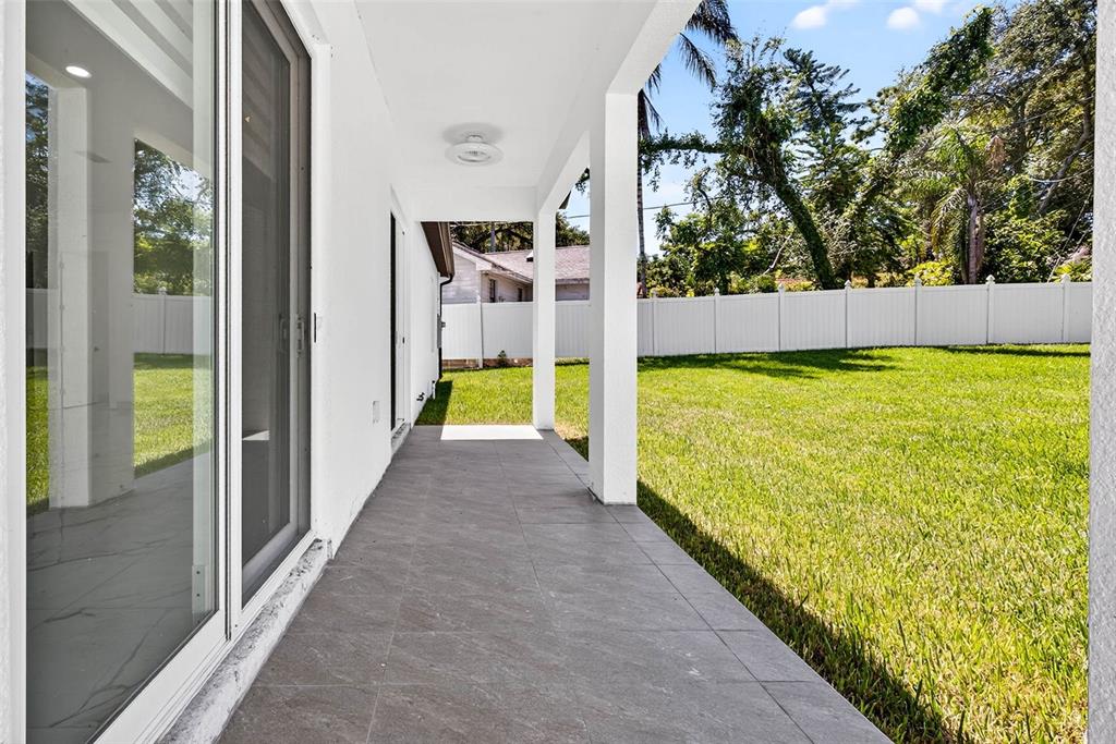 216 North Glen Arven Avenue Temple Terrace, FL 33617 - Photo 54 of 61 a view of a swimming pool with an outdoor seating space
