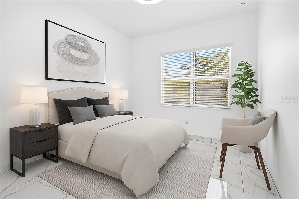 216 North Glen Arven Avenue Temple Terrace, FL 33617 - Photo 10 of 61 a bedroom with bed and a potted plant