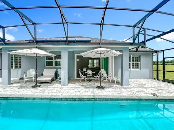a view of a dinning room with a backyard