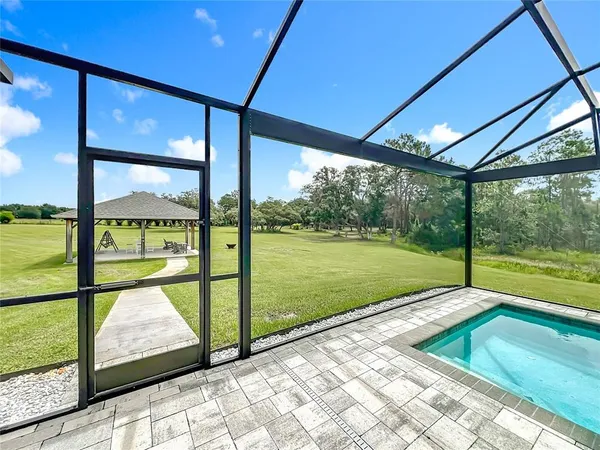 a view of swimming pool from a balcony
