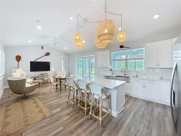 a view of a kitchen and dining room
