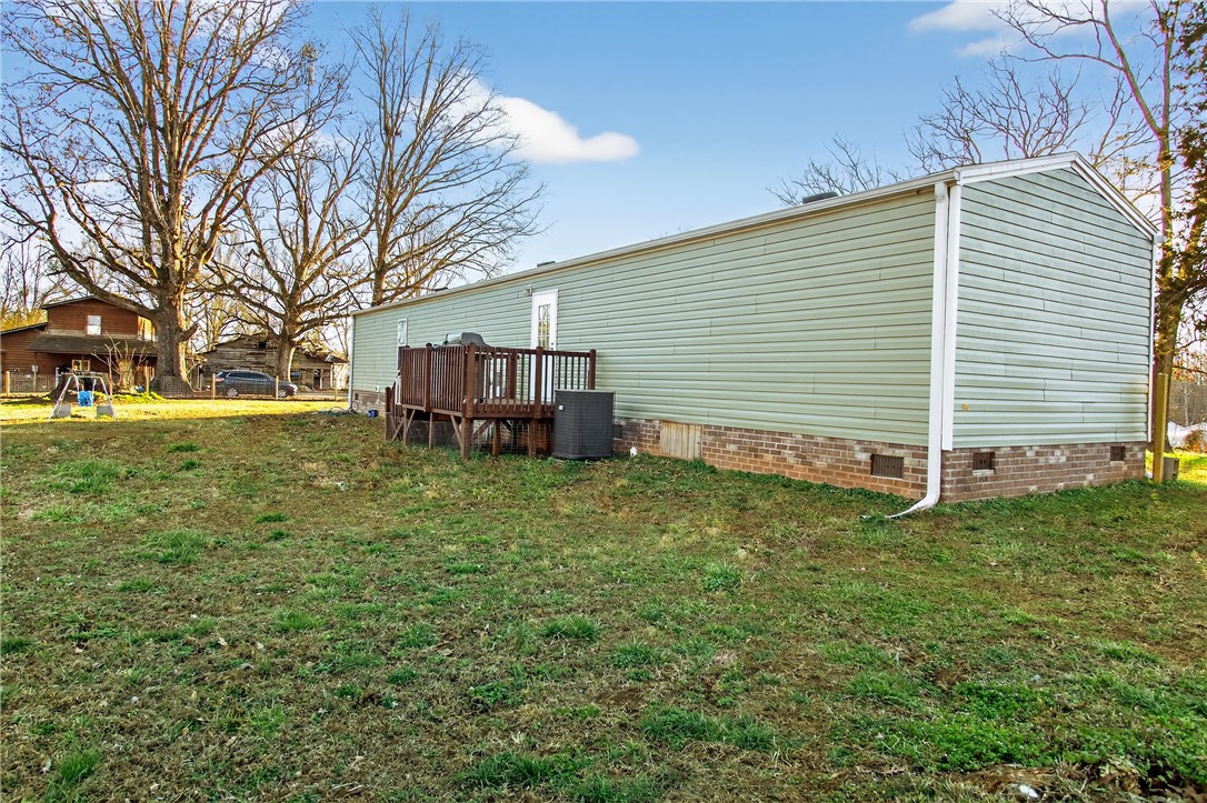 862 North Old Mill Road Easley, SC 29640 - Photo 3 of 24 This spacious property offers an expansive yard and a welcoming outdoor deck.
