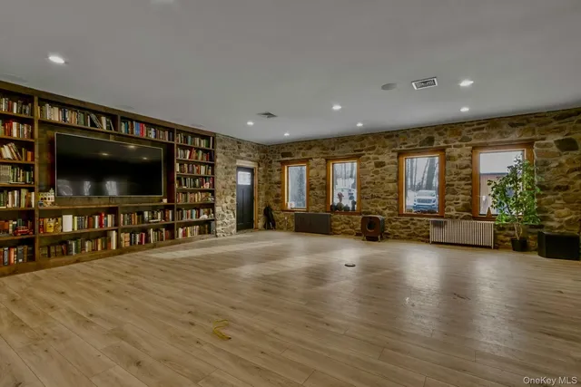 a view of a living room and a flat screen tv