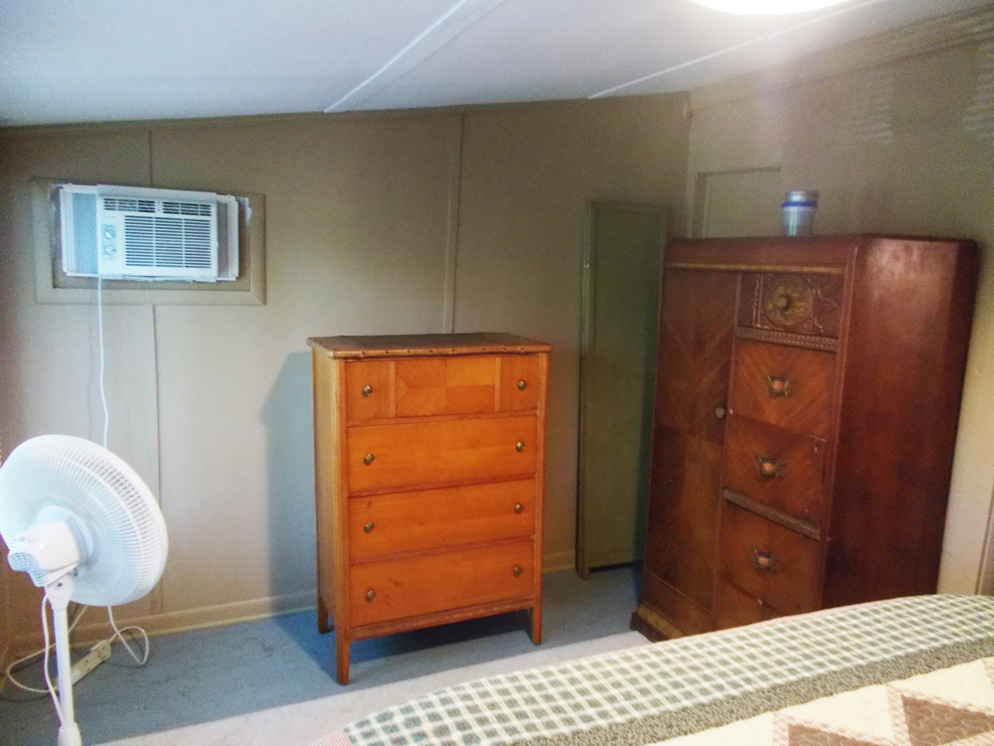 332 Mockingbird Hill Road Eva, TN 38333 - Photo 11 of 27 a room with cabinets and wooden closet