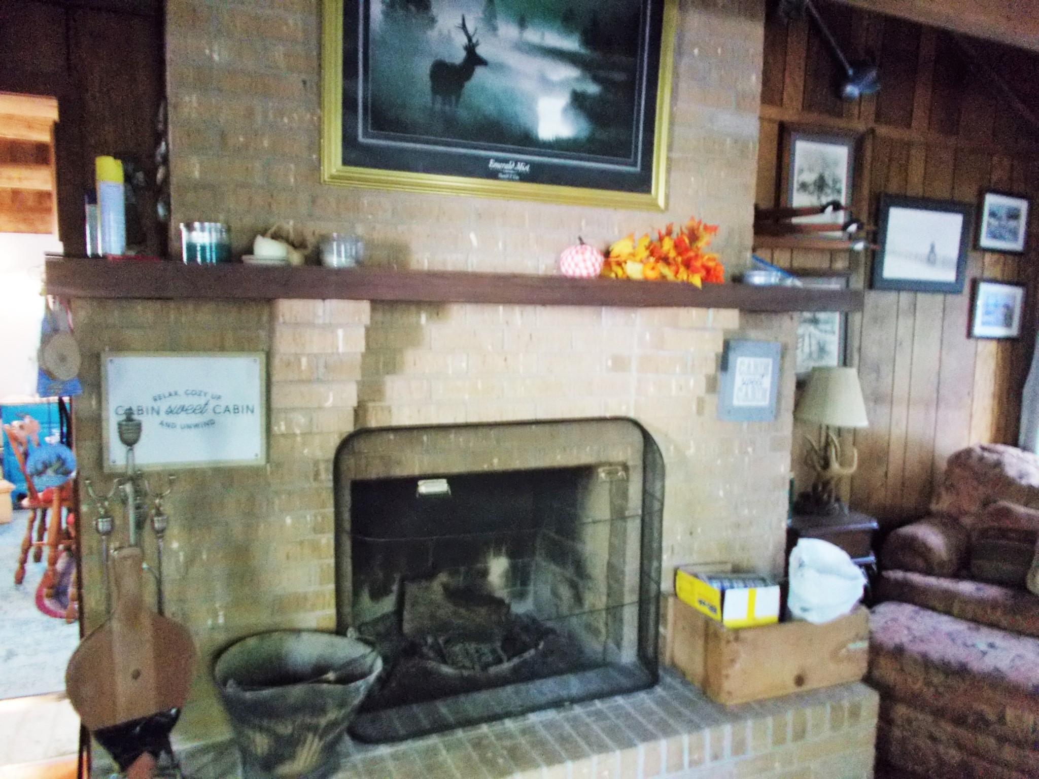 332 Mockingbird Hill Road Eva, TN 38333 - Photo 13 of 27 a room with fireplace and wooden floor