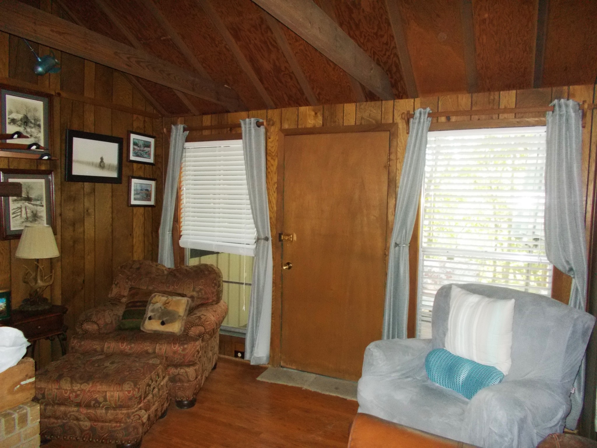 332 Mockingbird Hill Road Eva, TN 38333 - Photo 15 of 27 a living room with furniture and a window