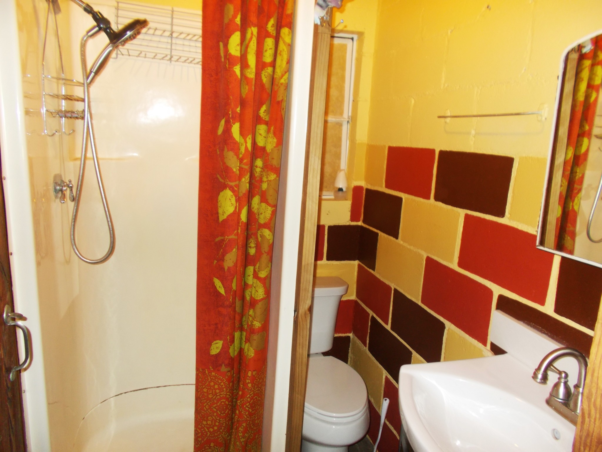 332 Mockingbird Hill Road Eva, TN 38333 - Photo 8 of 27 a white toilet sitting next to a small bathroom