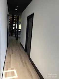 a view of hallway with stairs