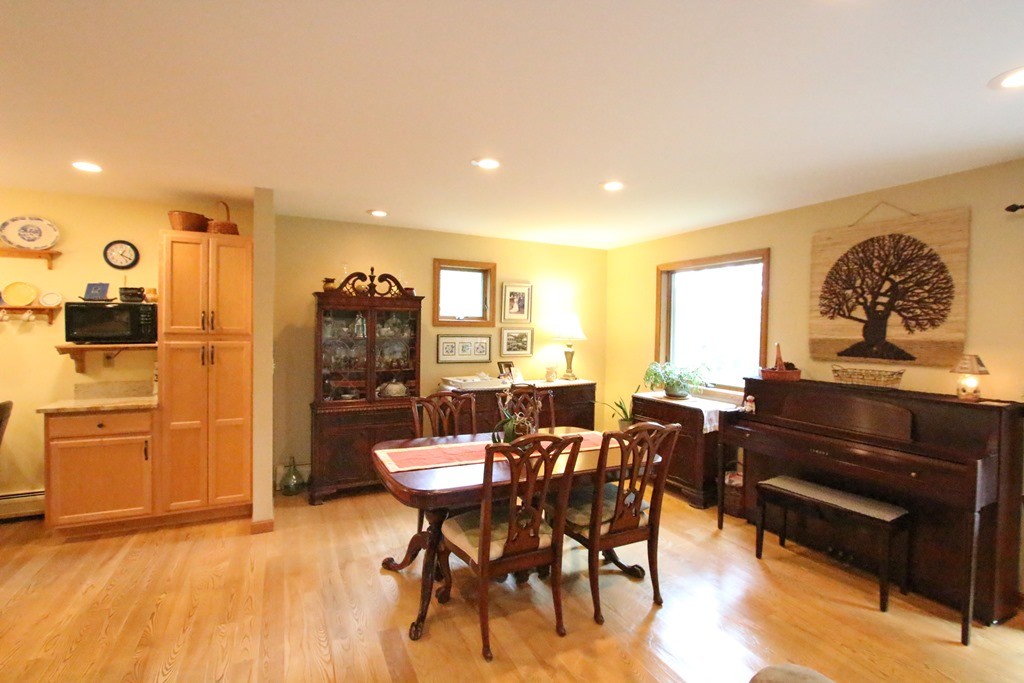 39 Harlow Clark Road Huntington, MA 01050 - Photo 11 of 30 a view of a dining room with furniture window and wooden floor