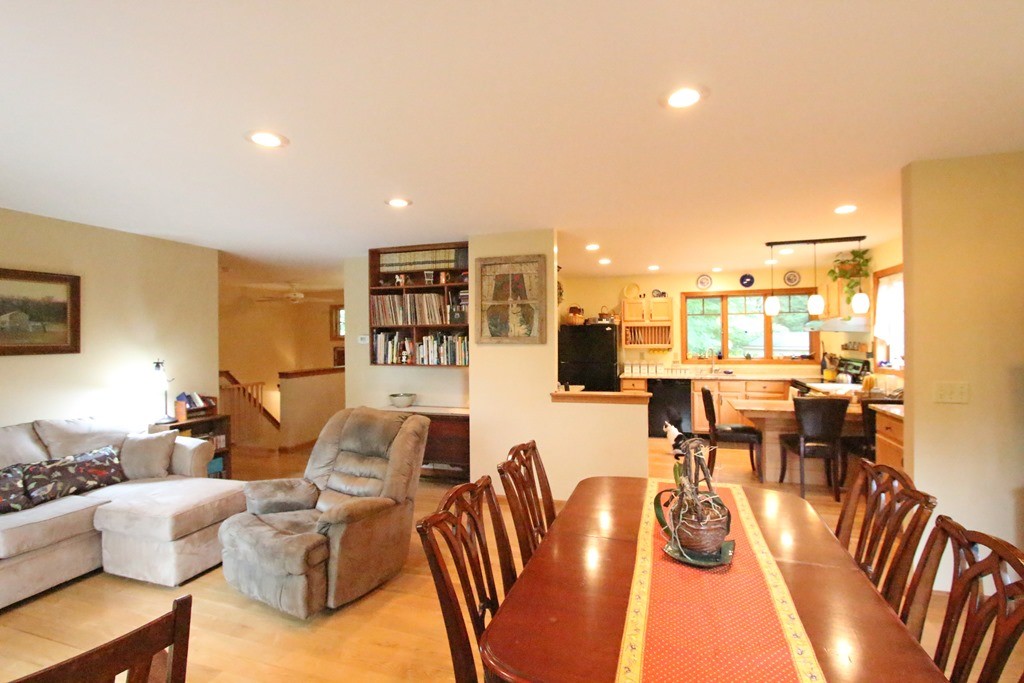 39 Harlow Clark Road Huntington, MA 01050 - Photo 12 of 30 a living room with lots of furniture and view of kitchen