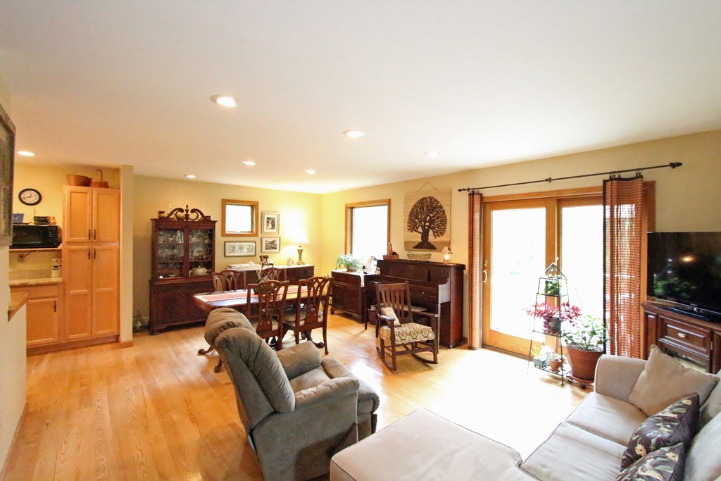 39 Harlow Clark Road Huntington, MA 01050 - Photo 14 of 30 a living room with furniture and a flat screen tv