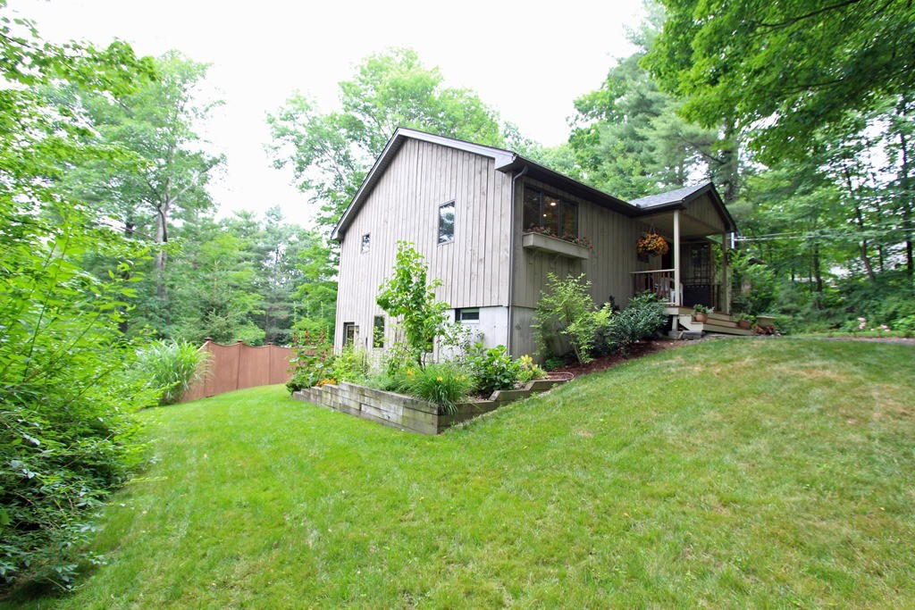 39 Harlow Clark Road Huntington, MA 01050 - Photo 2 of 30 a view of a house with backyard and garden