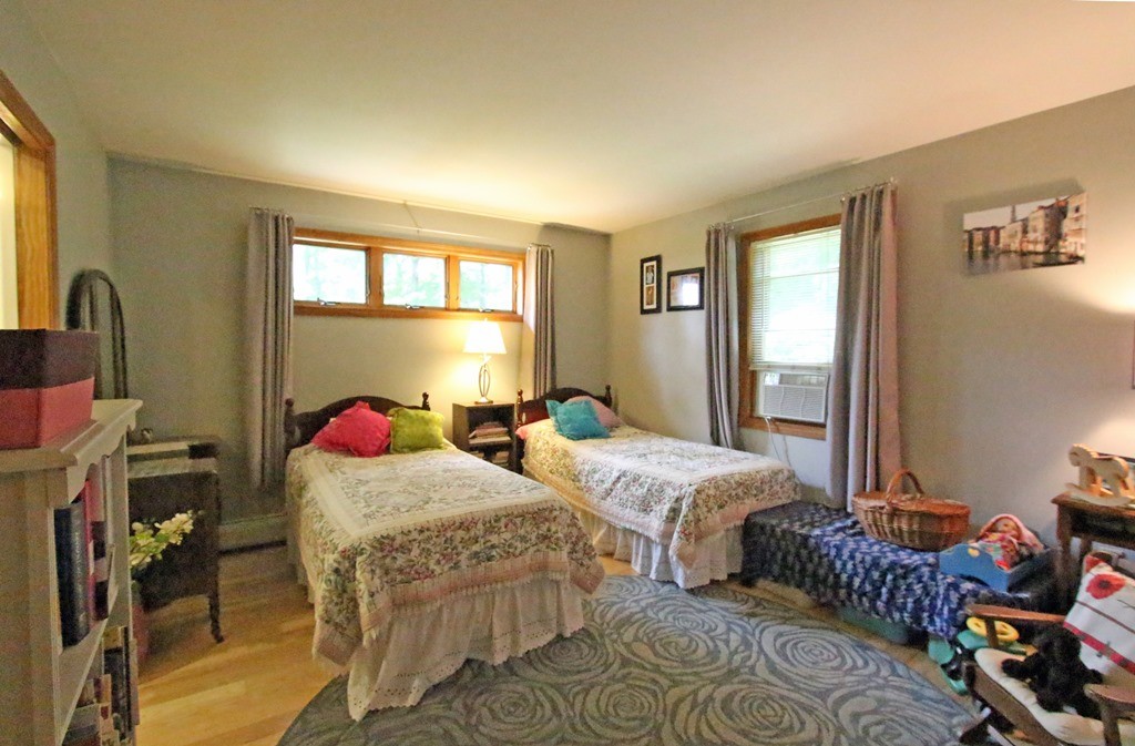 39 Harlow Clark Road Huntington, MA 01050 - Photo 21 of 30 a bedroom with two beds and a window