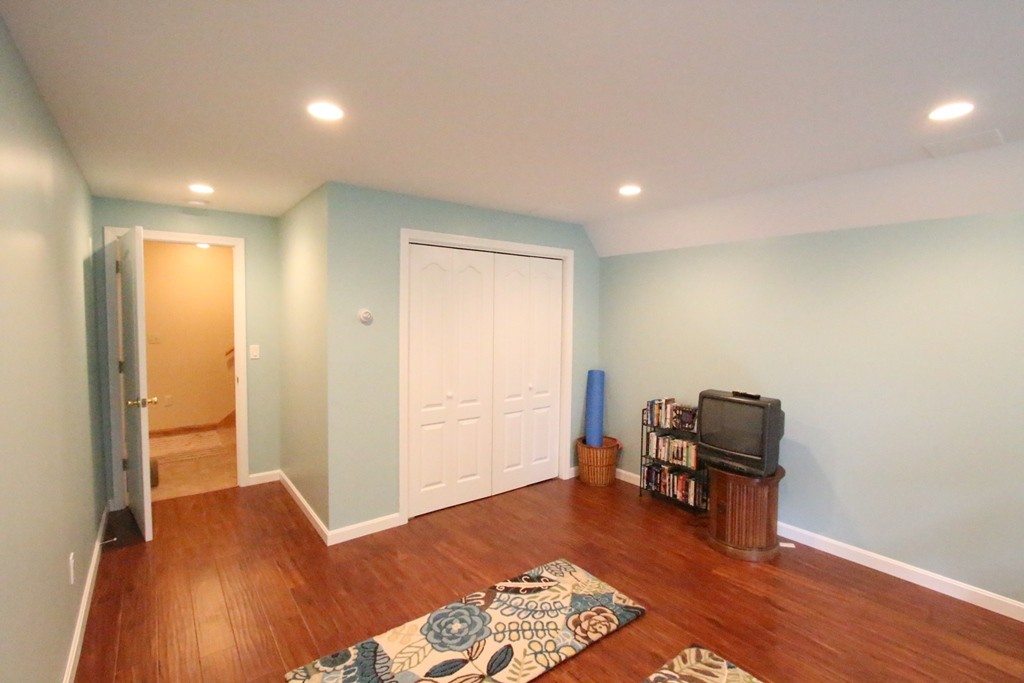 39 Harlow Clark Road Huntington, MA 01050 - Photo 24 of 30 a living room with furniture and a wooden floor
