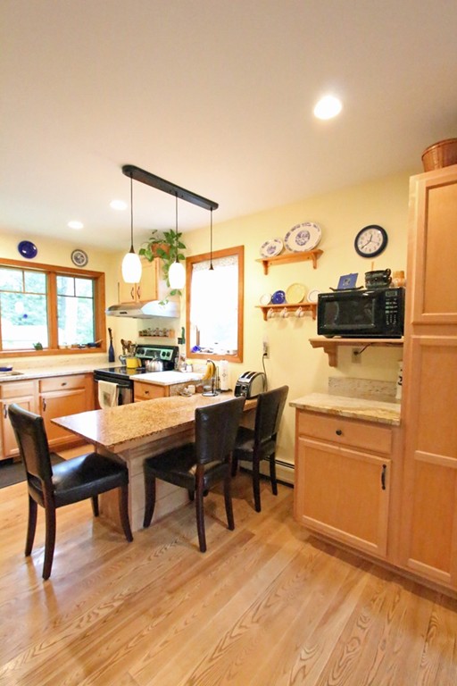 39 Harlow Clark Road Huntington, MA 01050 - Photo 7 of 30 a room with stainless steel appliances kitchen island granite countertop furniture and a kitchen view