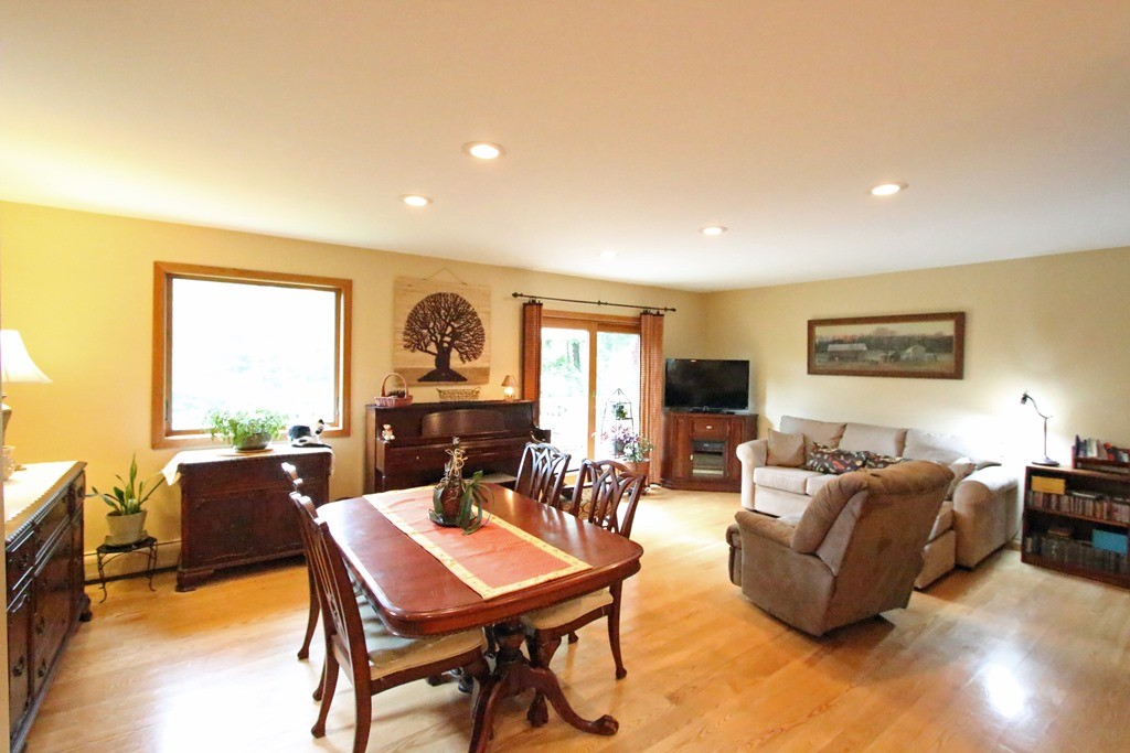 39 Harlow Clark Road Huntington, MA 01050 - Photo 10 of 30 a living room with furniture a large window and a flat screen tv