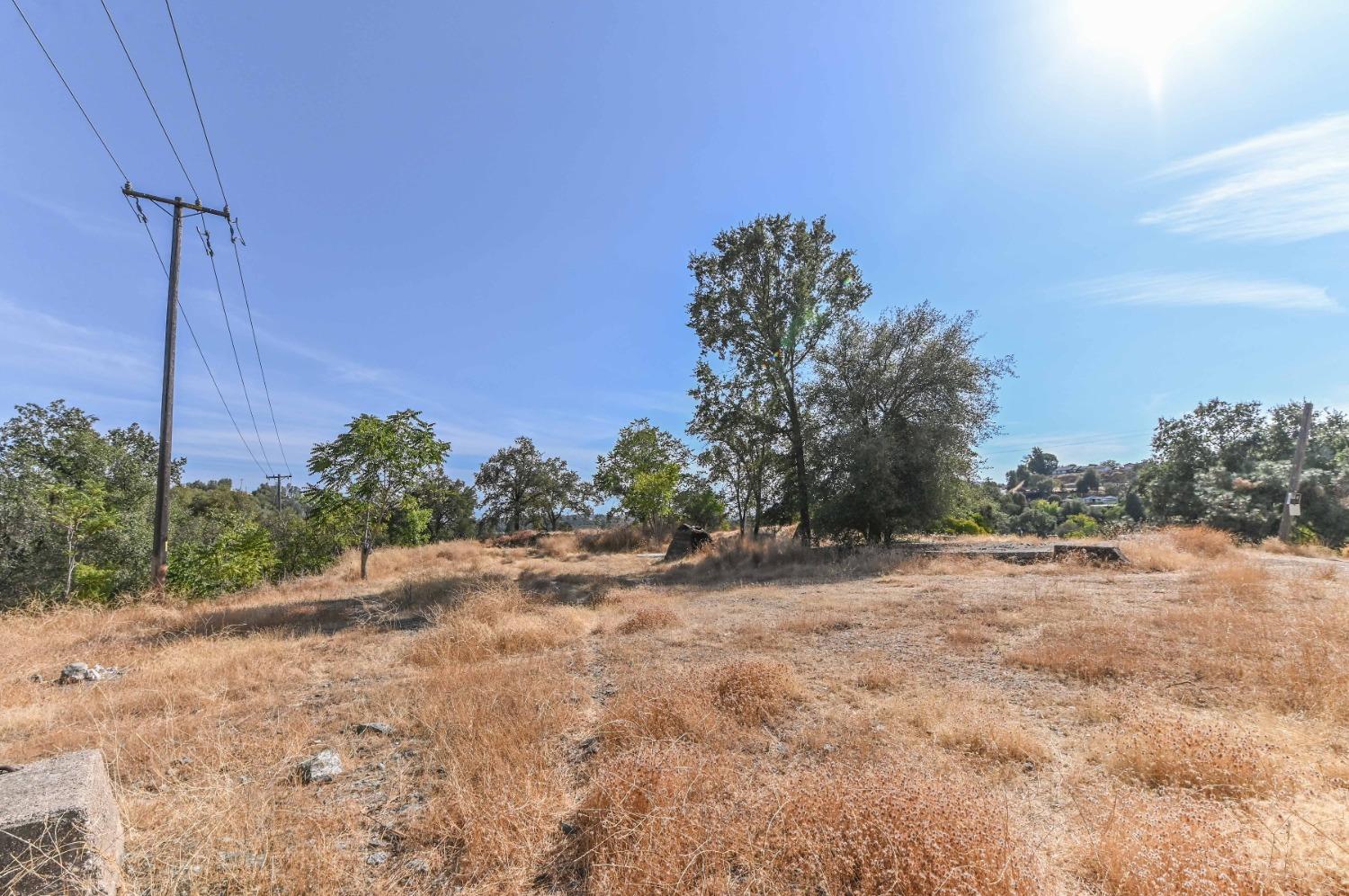 0 Raspberry Lane Angels Camp, CA 95222 - Photo 18 of 46 a view of a dirt road with a building in the background