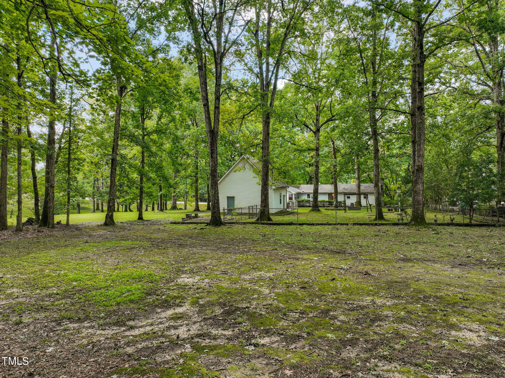 3015 Old Raleigh Road Apex, NC 27502 - Photo 32 of 47 a view of a trees in a yard