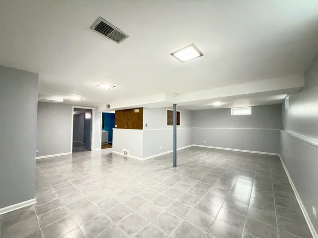 a view of a livingroom with a staircase