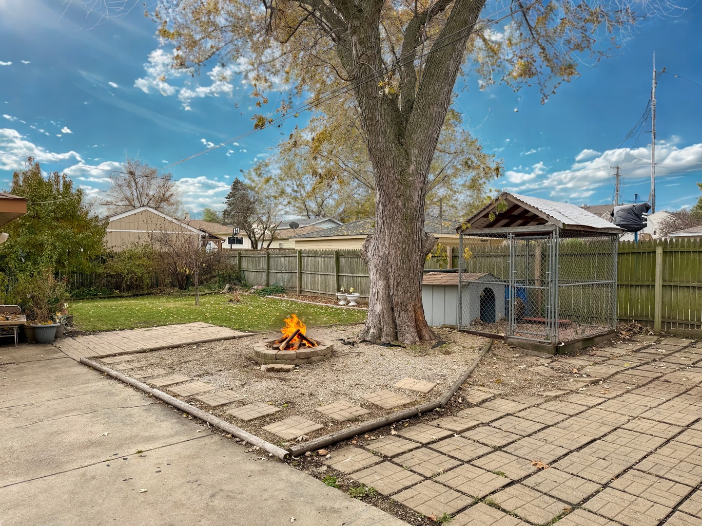 539 Rose Avenue Addison, IL 60101 - Photo 14 of 15 a view of a house with backyard and sitting area