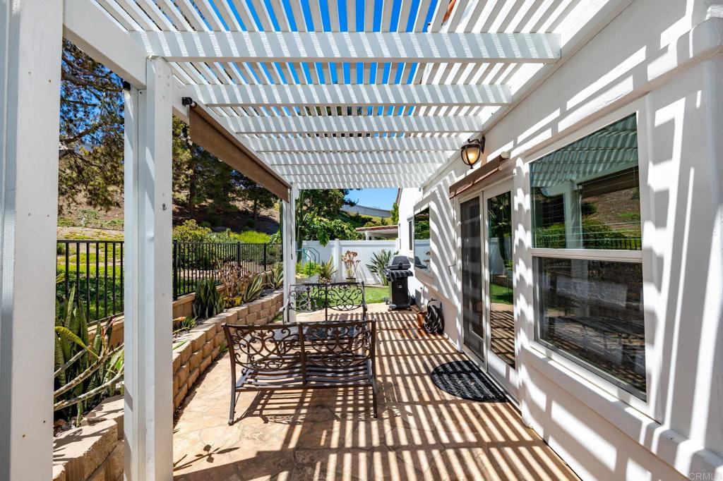 4939 Tilos Way Oceanside, CA 92056 - Photo 30 of 49 a view of porch with patio