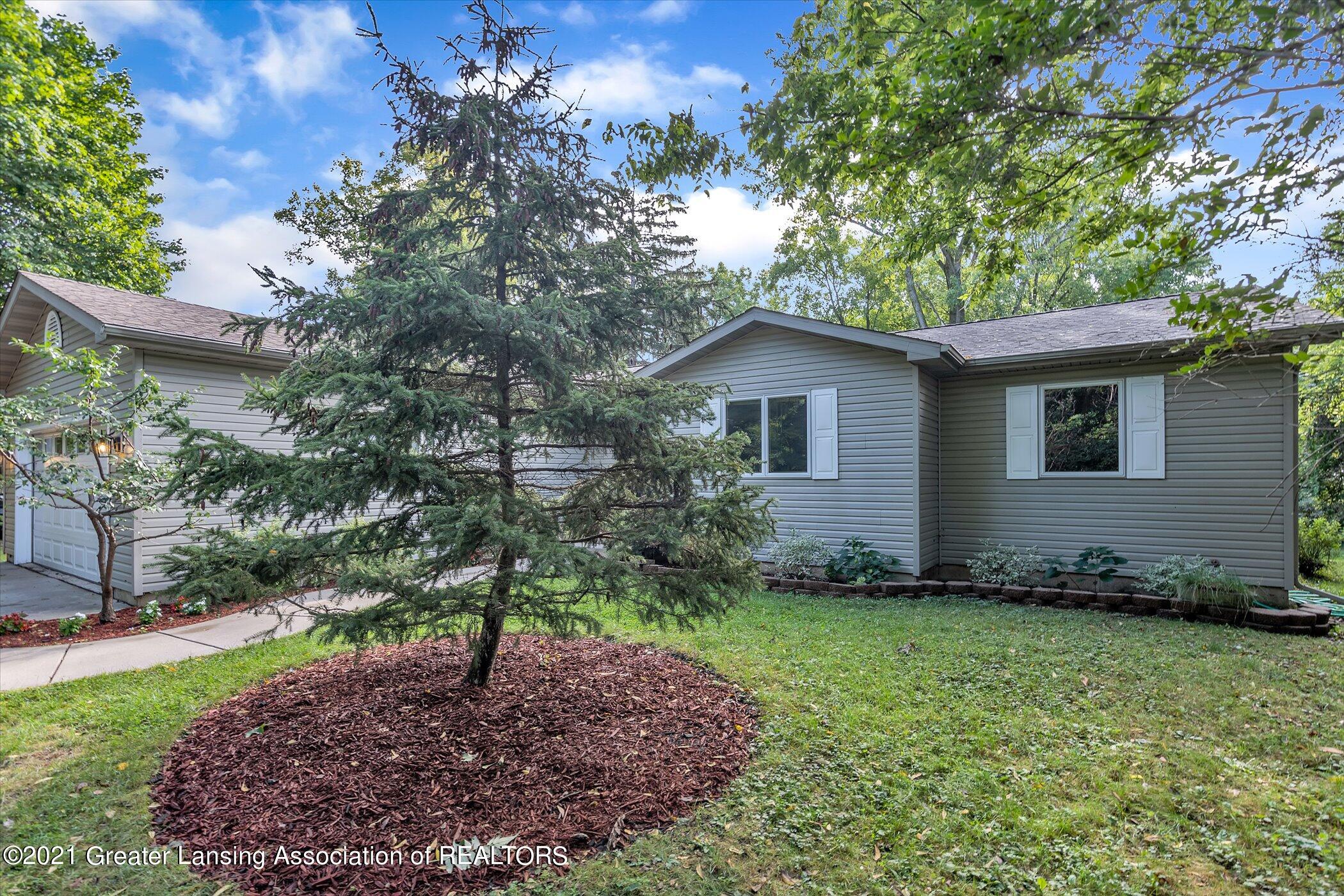 4603 Old Lansing Road Lansing, MI 48917 - Photo 2 of 34 02-4603-Old-Lansing-Rd-Windowstill-Real-
