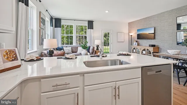 a kitchen with a sink and a window