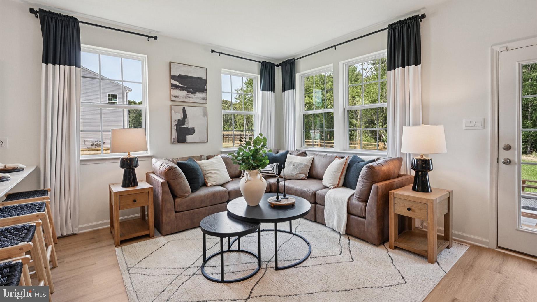 54 Robert Drive Runnemede, NJ 08078 - Photo 8 of 48 a living room with furniture and a large window