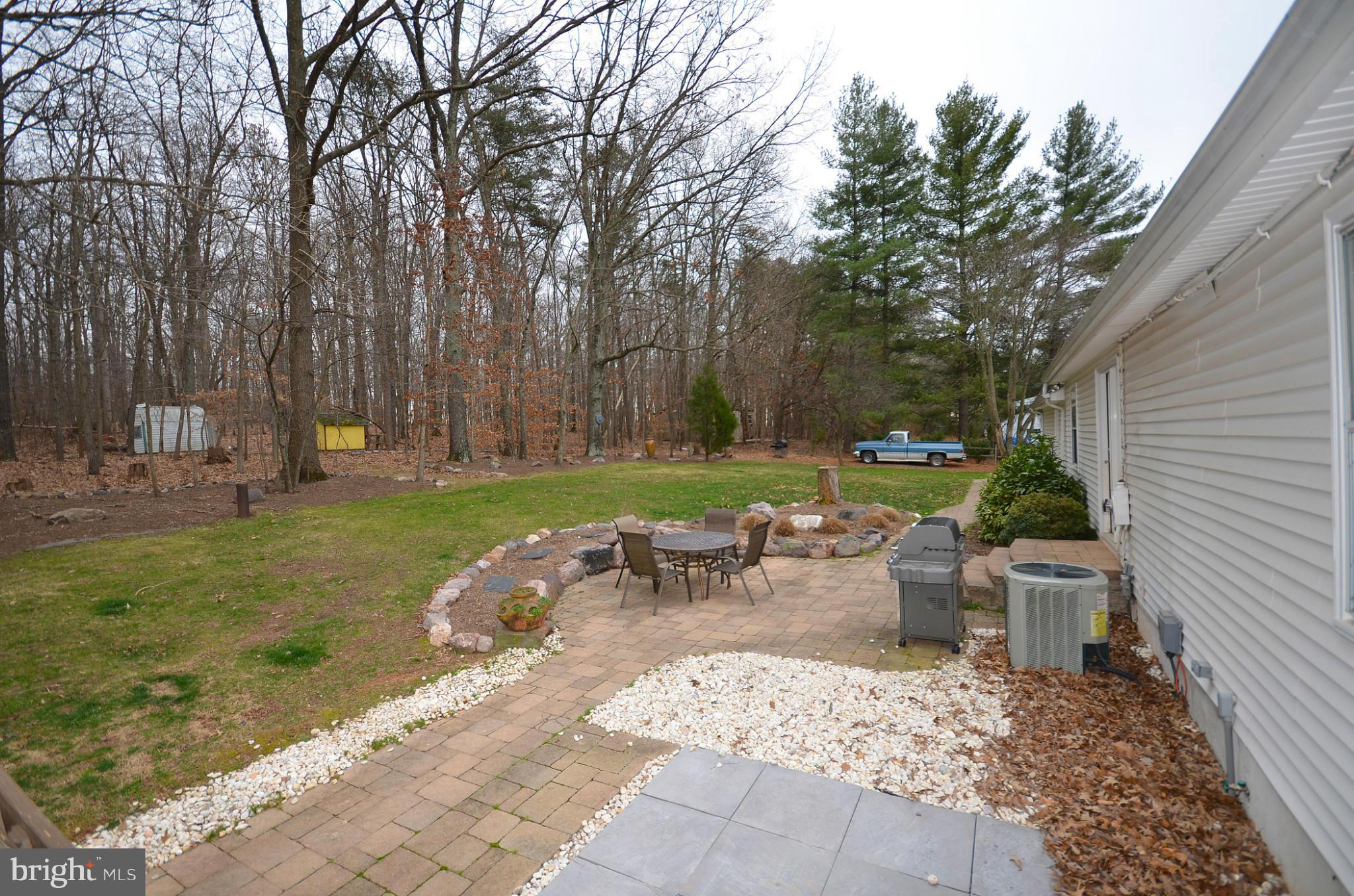 20952 Evergreen Mills Road Leesburg, VA 20175 - Photo 21 of 30 a view of a backyard with sitting area
